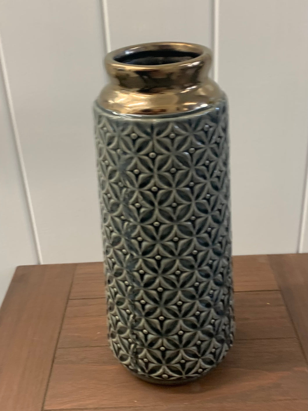 Grey vase with bronze neck